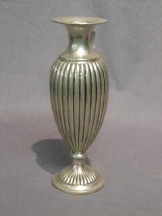 An oval and reeded silver plated vase 9 1/2"