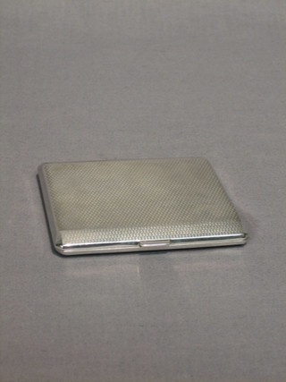 An Art Deco silver cigarette case with engine turned decoration, London 1928, 2 ozs