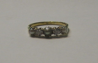 A lady's gold dress ring set 2 diamonds and 3 demi-pearls