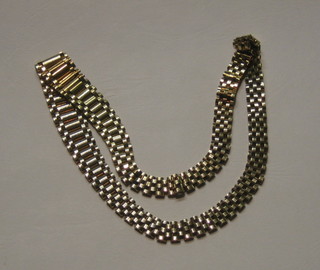 A lady's 9ct gold multi link necklet, 17", 1 oz