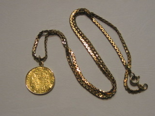 A George III 1704, half sovereign contained in a pendant mount, hung a gold chain
