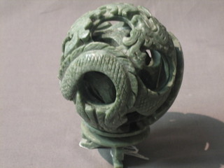 A green hardstone puzzle ball 4"
