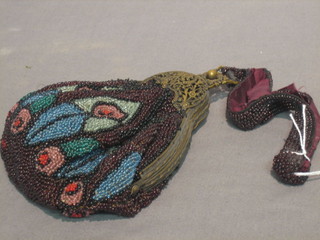 An Art Nouveau bead work evening bag with pierced gilt mounts