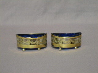 A  pair  of  silver  plated  boat shaped salts  on  bun  feet  3  1/2"