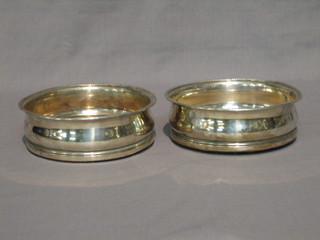 A pair of 19th Century circular silver plated wine coasters 5 1/2"