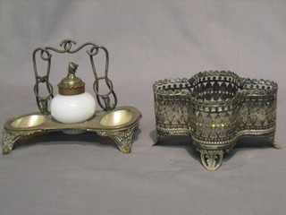 A 19th Century engraved brass and shell standish, the centre with  milk glass inkwell 7"