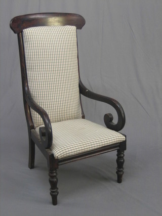 A  19th  Century  mahogany bar back open arm  chair  raised  on turned supports