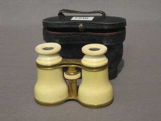 A pair of ivory cased opera glasses
