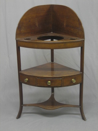 A   Georgian  mahogany  corner  wash  stand  the  top   fitted   3 receptical  holes,  the  base fitted a  drawer  and  with  undertier, raised on splayed feet 25"