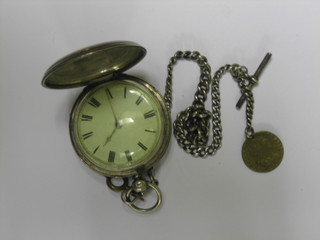 A  Victorian  pair  cased fusee pocket watch  by  M  Bromley  of Horsham,  contained  in a silver case, London 1875,  hung  on  a silver curb link chain 12"