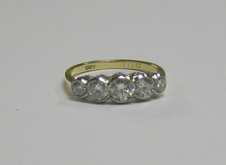 A   lady's  attractive  18ct  gold  engagement/dress  ring,   set   5 diamonds (approx 1.10ct)