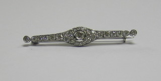 A lady's gold bar brooch set diamonds (approx 1.06ct)