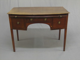 A  Georgian mahogany bow front sideboard/dressing table,  fitted a  brushing  slide  above 1 long and 2  short  drawers,  raised  on square tapering supports 39"