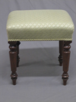 A rectangular Victorian mahogany stool raised on turned supports 17"