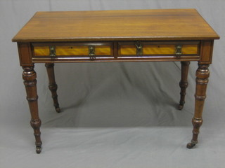 A  Victorian  mahogany rectangular library table, fitted  2  frieze drawers and raised on turned supports 42"
