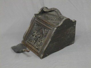 A Victorian heavily carved coal box with hinged lid 16"