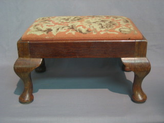 A  rectangular  mahogany foot stool raised  on  cabriole  supports 14"