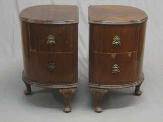 A  pair  of Art Deco oval walnut bedside chests fitted  2  drawers raised on cabriole supports 15"