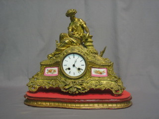 A 19th Century French 8 day striking clock, surmounted by a gilt spelter   figure  of  a  seated  lady  depicting  The   Harvest   16"