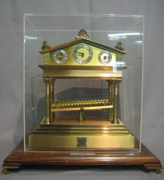 A  Rolling  Ball clock (The Congreve Clock) by  Thwaites  & Reed,  limited  edition  number  15 of 100,  contained  with  in  a glazed case
