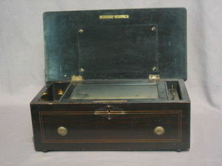 A 19th Century cylinder music box with 6" barrel, contained in a rosewood case, 13"