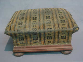 A  Victorian  mahogany  framed square footstool,  raised  on  bun feet 13"