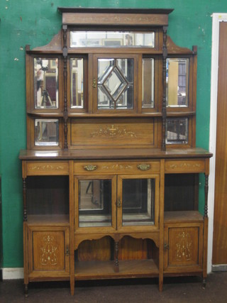 A  Victorian  inlaid  rosewood  chiffonier  display  cabinet   with raised  mirrored  back,  the  base fitted  1  long  drawer  above  a cupboard flanked by a recesses, 54"