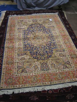 A  Belgian  cotton  blue  ground  Persian  style  rug  with  central medallion 91" x 59 1/2"