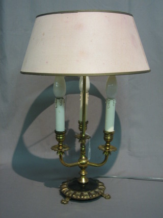 A gilt metal 3 light electric library table lamp