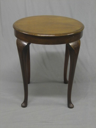 A  1930's circular mahogany occasional table, raised on  cabriole supports 24"