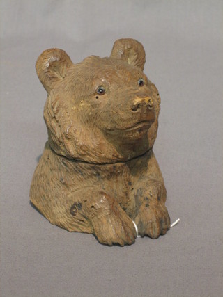 A  19th/20th  Century carved Bavarian inkwell in the  form  of  a bear 4"