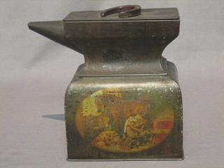 A MacFarlane Lang & Co biscuit tin in the form of an anvil,  the base decorated a forge scene, the base marked MacFarlane   Lang &   Co   by  Appointment  Biscuit  Manufacturer's   Glasgow   & London 5"