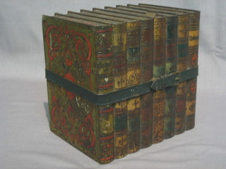 A  Huntley & Palmer biscuit tin in the form of 8 books, the  base marked Huntley & Palmer 7"
