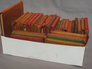 Various  Edwardian  miniature editions of  books,  leather  bound
