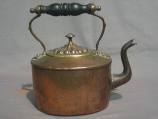 A  19th  Century  copper  kettle with  turned  wooden  handle  8"