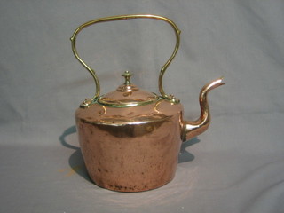 A 19th Century copper kettle with brass handle 11"
