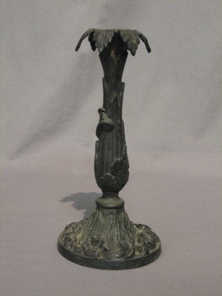 A 19th Century iron candlestick 10"