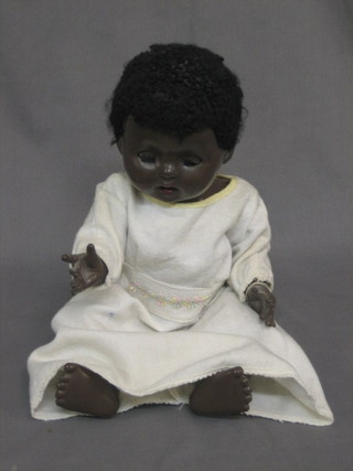 A Rosebud black plastic doll