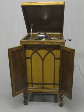 A Standard gramophone contained in an oak case
