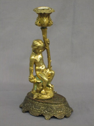 A  19th  Century gilt bronze candlestick in the form of  a  cherub 10"