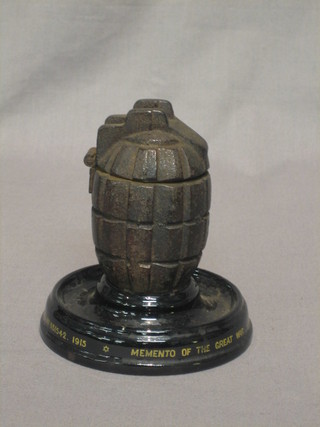 A  WWI  Mills bomb converted for use as an ink  well  complete with china liner, raised on a ceramic base, marked a Momento of The  Great  World War, Actual Hand Grenade Casting  As  Used  By The Allies