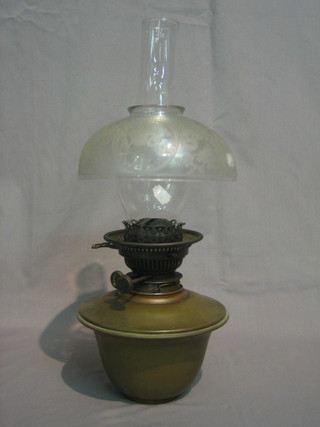 A 19th Century brass oil lamp reservoir with clear glass  chimney and etched glass shade
