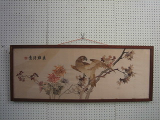 An  Oriental  embroidered  panel depicting an  eagle  15"  x  40"