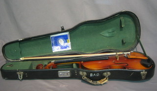 A  Chinese violin with 14" back and complete with carrying  case