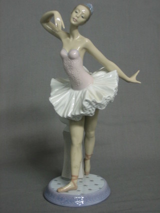 A Lladro figure of a standing ballet dancer, the base incised 6323 10"
