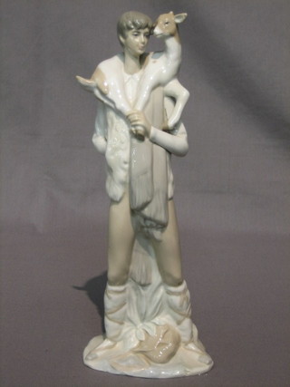 A Lladro figure of a standing man with goat, 11"