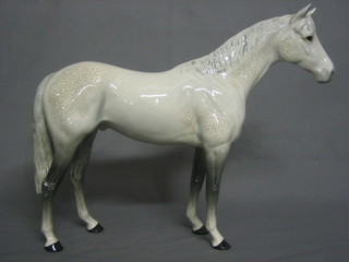 A  Beswick  figure of a standing dapple grey horse  11" 
