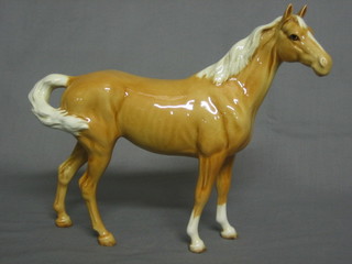 A  Beswick  figure  of  a  standing  Palomino  horse  9"  
