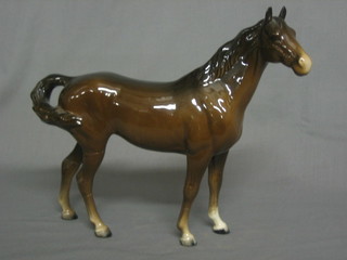 A  Beswick figure of a bay horse (1 back and 1 front leg f and  r) 9"