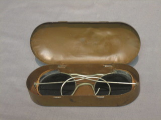A  pair  of Air Ministry issue tinted glasses complete  with  metal case